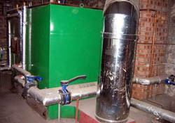 Hot water and heating in the House are provided by a wood chip boiler