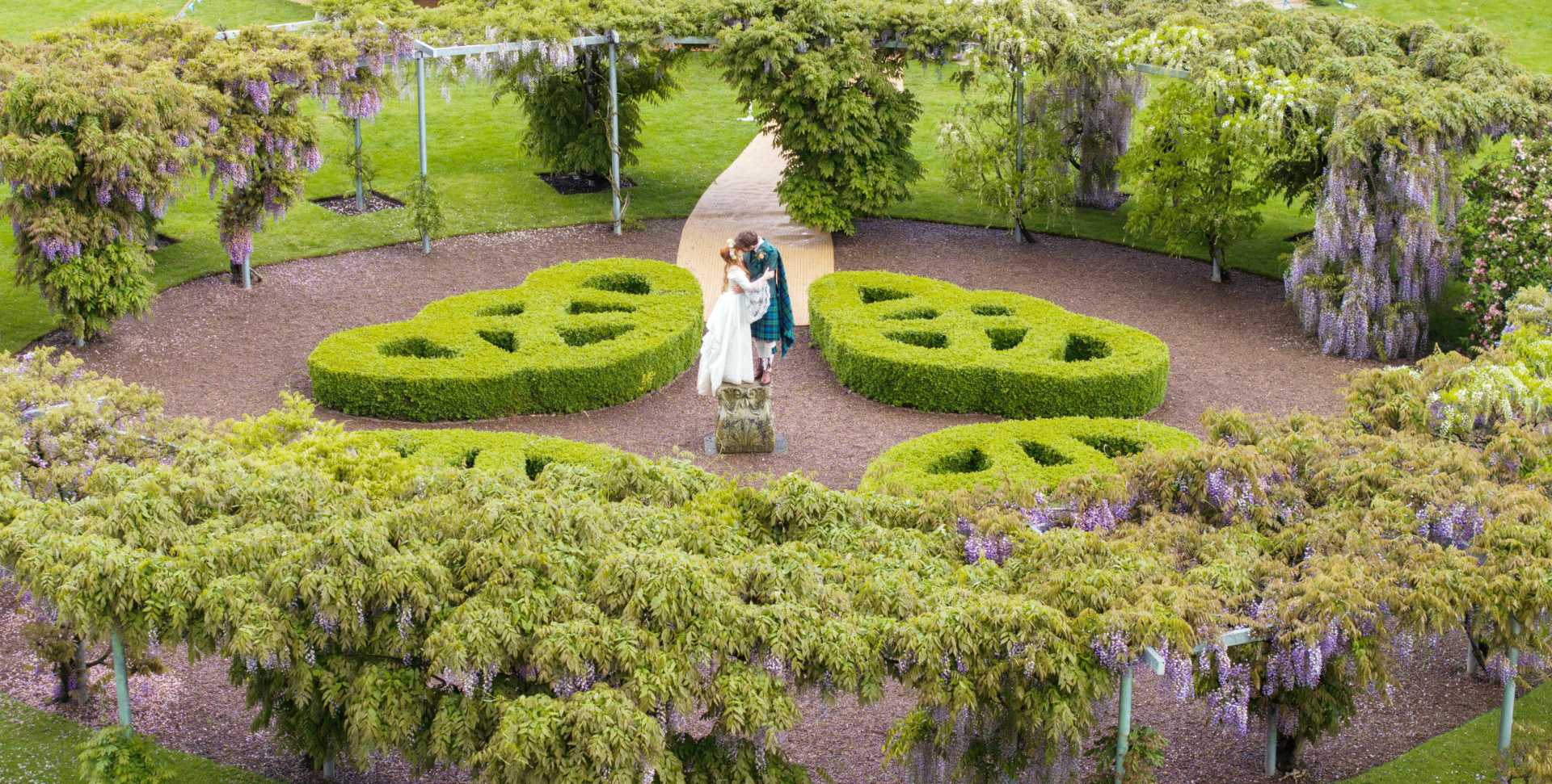 Lexi & Seumas in the Wisteria - Winton Castle Wedding Venue