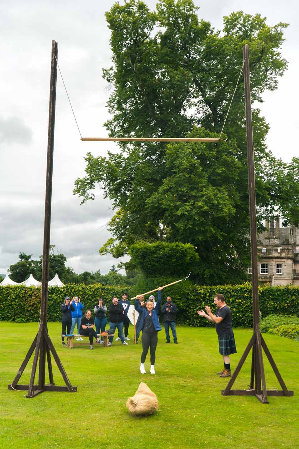 Tossing Wheat Sheaf at Mini Highland Games